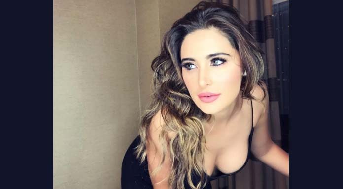 Nargis Fakhri who started her Bollywood acting in 2011 with the romantic drama Rockstar shared the picture where she was getting ready to attend IFFA 2017 (Photo/Nargis Fakhri Instagram)