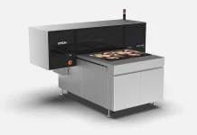 Epson Launches ₹49.8 Lakh UV Flatbed Printer in India for Custom Merchandise The printer ses ultraviolet light to instantly cure and harden ink onto surfaces including wood, acrylic, glass, metal, plastic, leather and ceramic tiles.